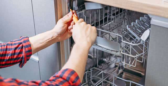 repairing an appliance in Broken Arrow, OK